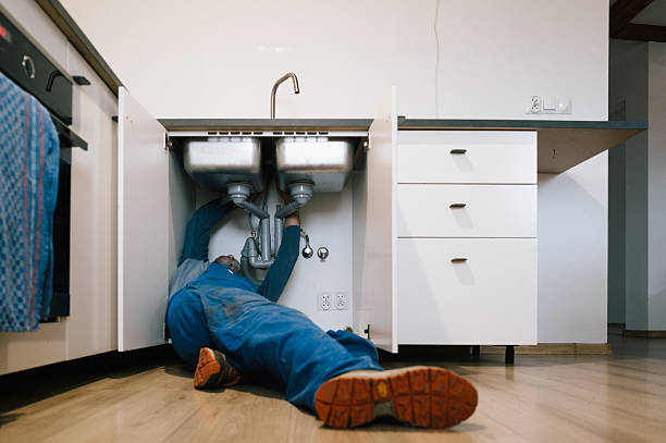 Professional Plumbing technician working in Childersburg, AL